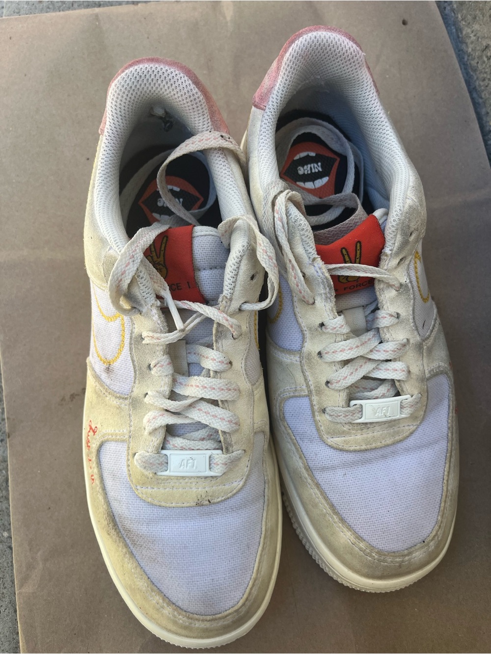 Nike Men’s White and Beige Casual Sneakers with Red Accents